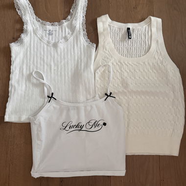 3 tops blancs Gr. 146/152