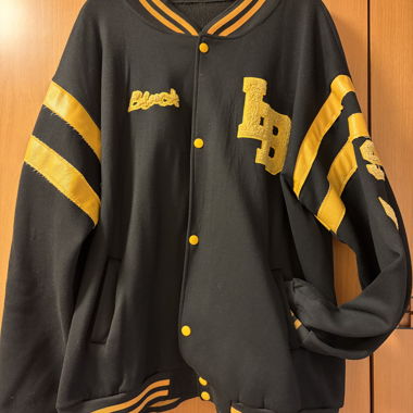 Giacca varsity nera e gialla