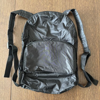 Foldable black nylon backpack