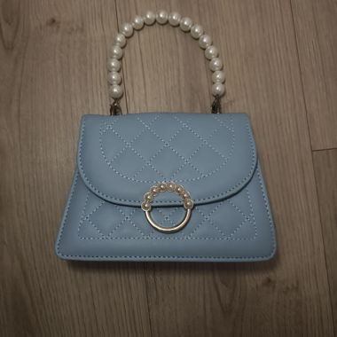 Blaue Tasche mit Gurtband