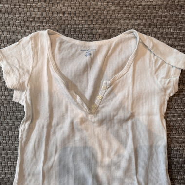 Top a coste bianco con patta con bottoni Brandy Melville