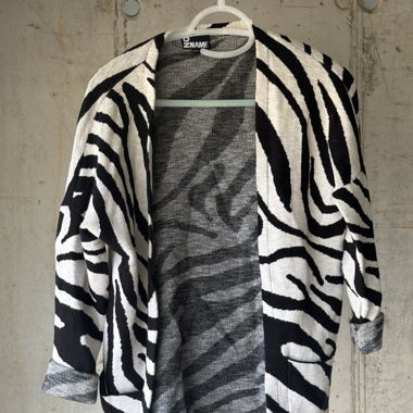 Black and white zebra gilet
