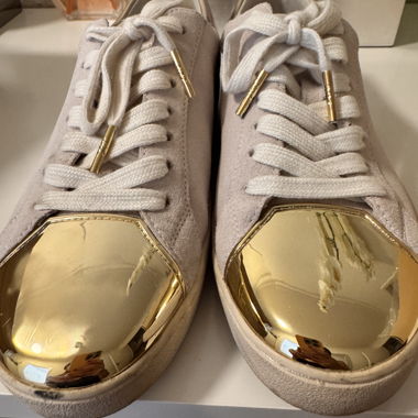 Goldene Michael Kors Sneaker