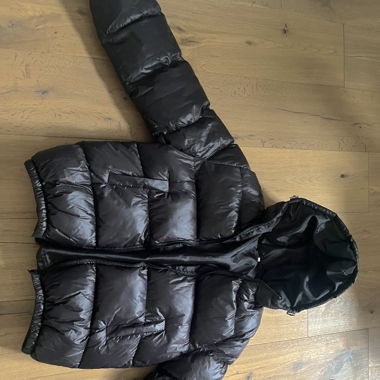 Schwarze Puffer Jacke