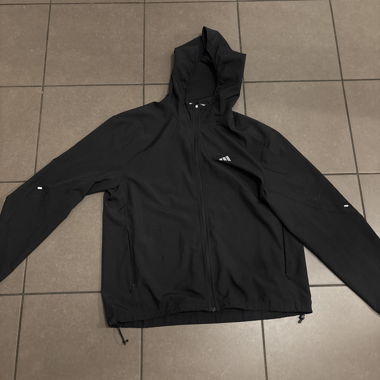 Top running adidas taglia M