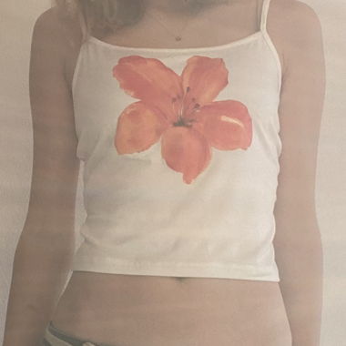 Top con fiore