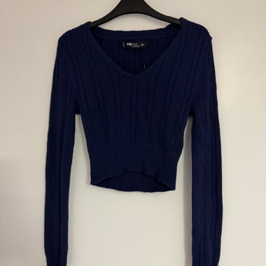 Maglione corto con scollo a V