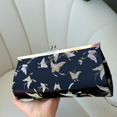 Vintage Clutch mit Schmetterlingsmuster