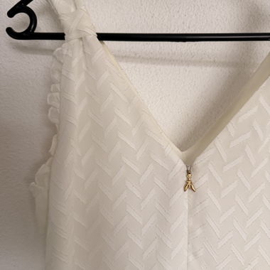White Jumpsuit with V-Neck