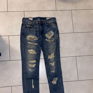 Diesel jeans with holes