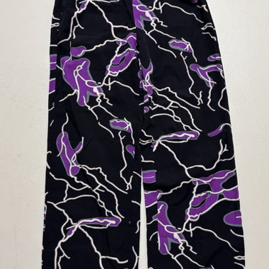 Pantaloni in tessuto nero viola