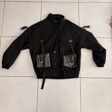Veste utilitaire noire avec poches transparentes