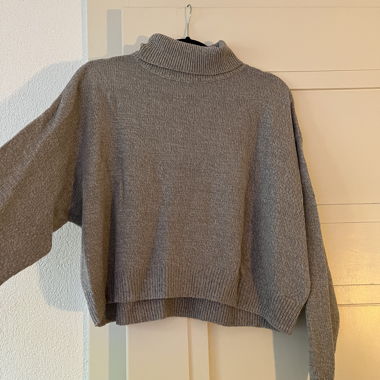 Pull gris col roulé 