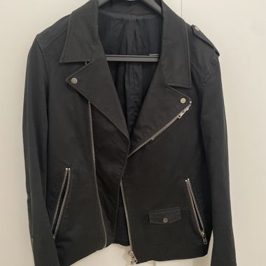 Black jacket with zippers