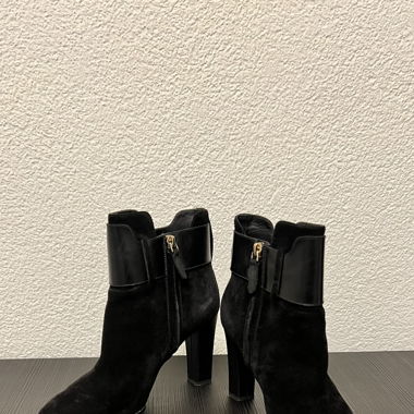 Tod's black ankle boots