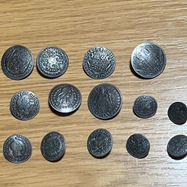 Set of 14 decorative coin-like metal buttons