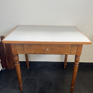 Wooden table with drawer