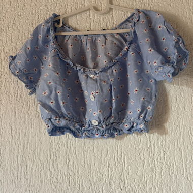 Blue blouse top with floral pattern