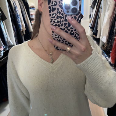 Glitzernder Pullover