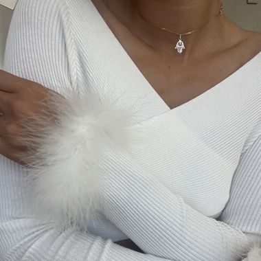 White cross-front ribbed top – feather cuffs