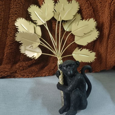 Statuette singe feuille dorée
