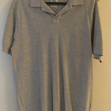 Polo grigia Zara