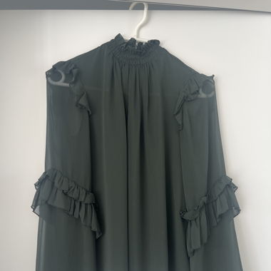 Bluse mit Rüschchen