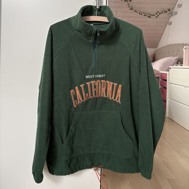 Felpa in pile verde con mezza zip