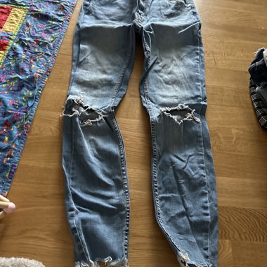 Jeans strappati celesti