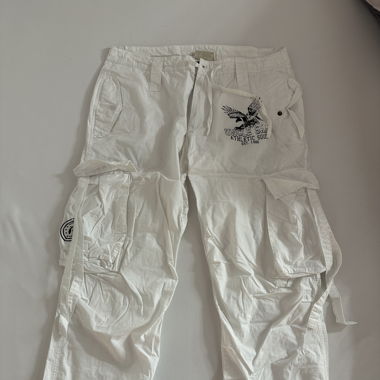 white cargo pants with black print ons