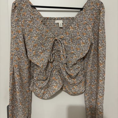 Blusa floreale a maniche lunghe