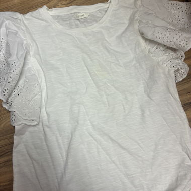 White top with ruffles and lace