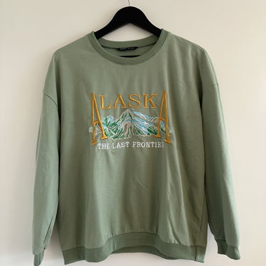 Grüner Pullover