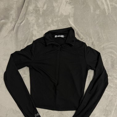 Nahtloses schwarzes Longsleeve mit Zipper 