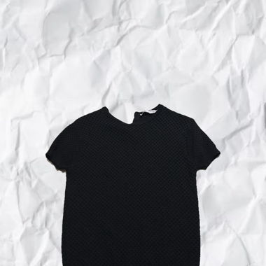 Top with shiny buttons 