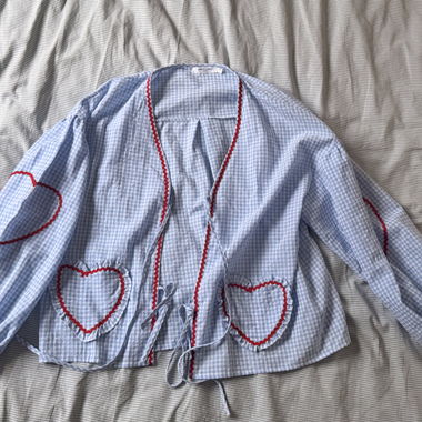 Blusa a quadretti con cuori