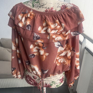 Blusa con stampa floreale