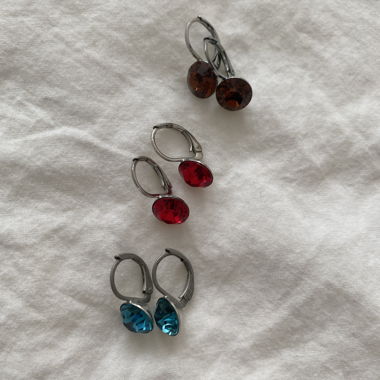 Set of three pairs of earrings with stones