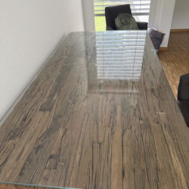 Dining table with glass top