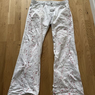 Jeans bianchi con motivo a spruzzi