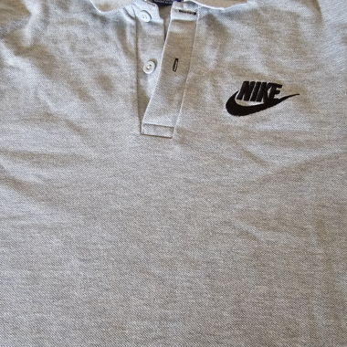 Nike polo gris