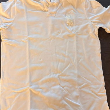 Polo bianco con ricamo