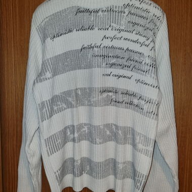 White sweater with text motifs