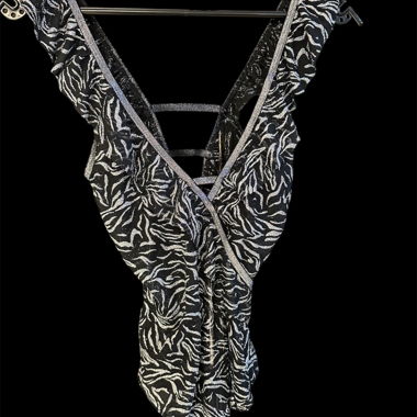Body con paillettes e stampa zebrata