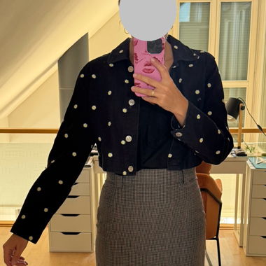 Black denim jacket with small flowers