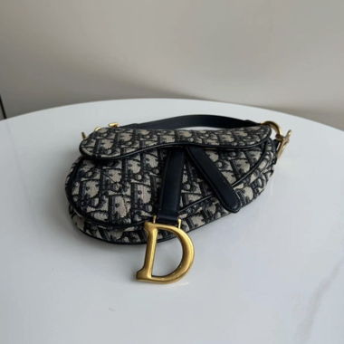 Borsa saddle con motivo monogramma