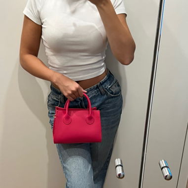 Elegante rosa Handtasche