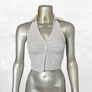 white sleeveless polo top