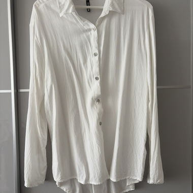 Blusa bianca a maniche lunghe