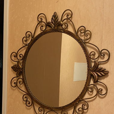 Miroir rond avec motif en fer forgé 